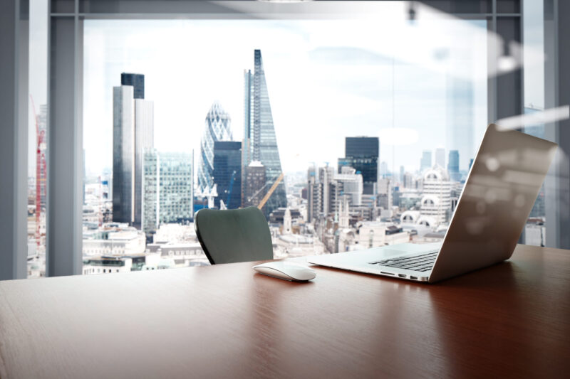 Office,Workplace,With,Laptop,And,Smart,Phone,On,Wood,Table